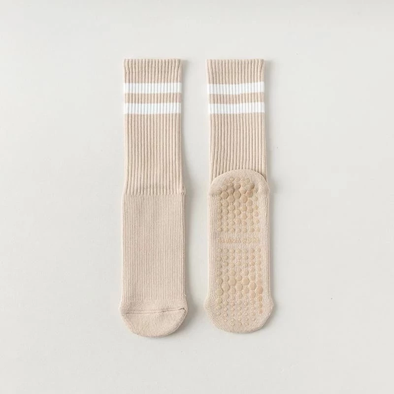 Calcetines de yoga de algodón antideslizantes de media caña con amortiguación para pilates y deportes.